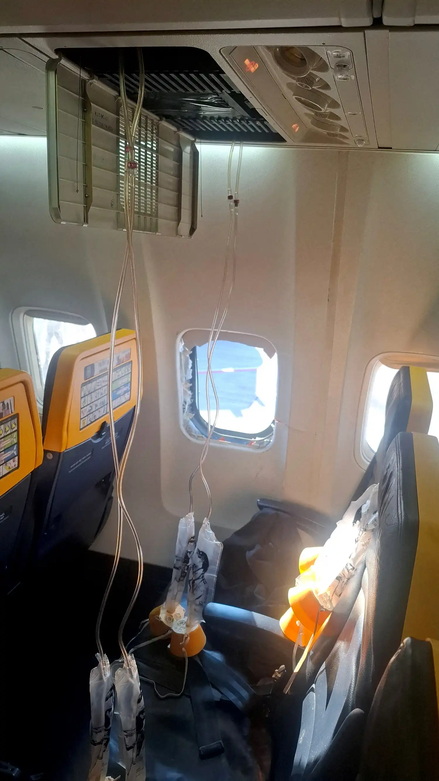 The broken window of the Ryanair aircraft